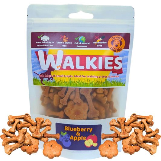 dog treats blueberry & apple resealable bag with biscuits outside the bag