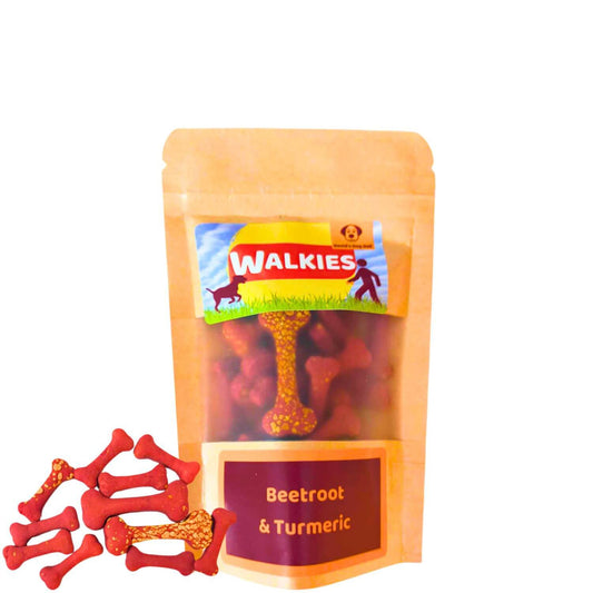 Beetroot & Turmeric Dog Treats small bag with biscuits outside the bag